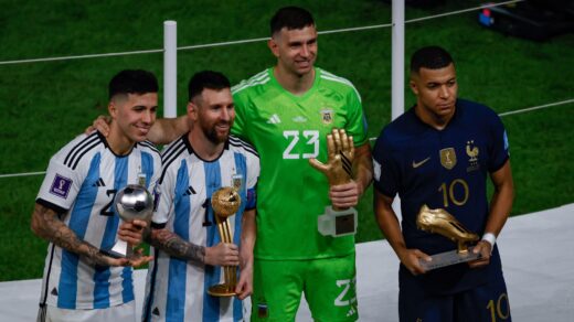 Enzo Fernandez Lionel Messi Emi Martinez and Kylian Mbappe pose with their trophies